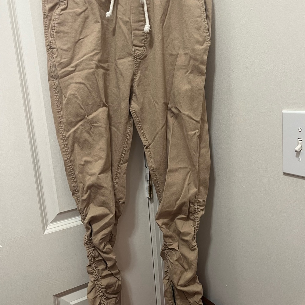 H&M Tan pants featuring working zippers on both legs
